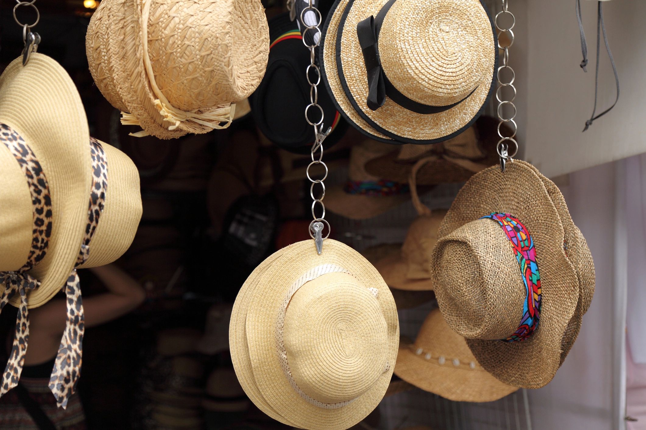 Display of assorted hats in a market collection